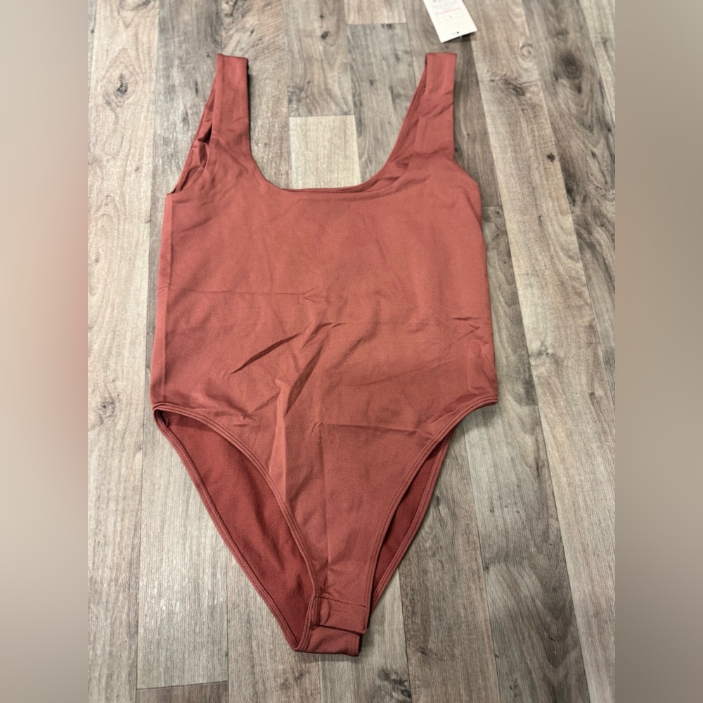 Women’s NWT A New day Body Suit‎ Size Small In Rose Color